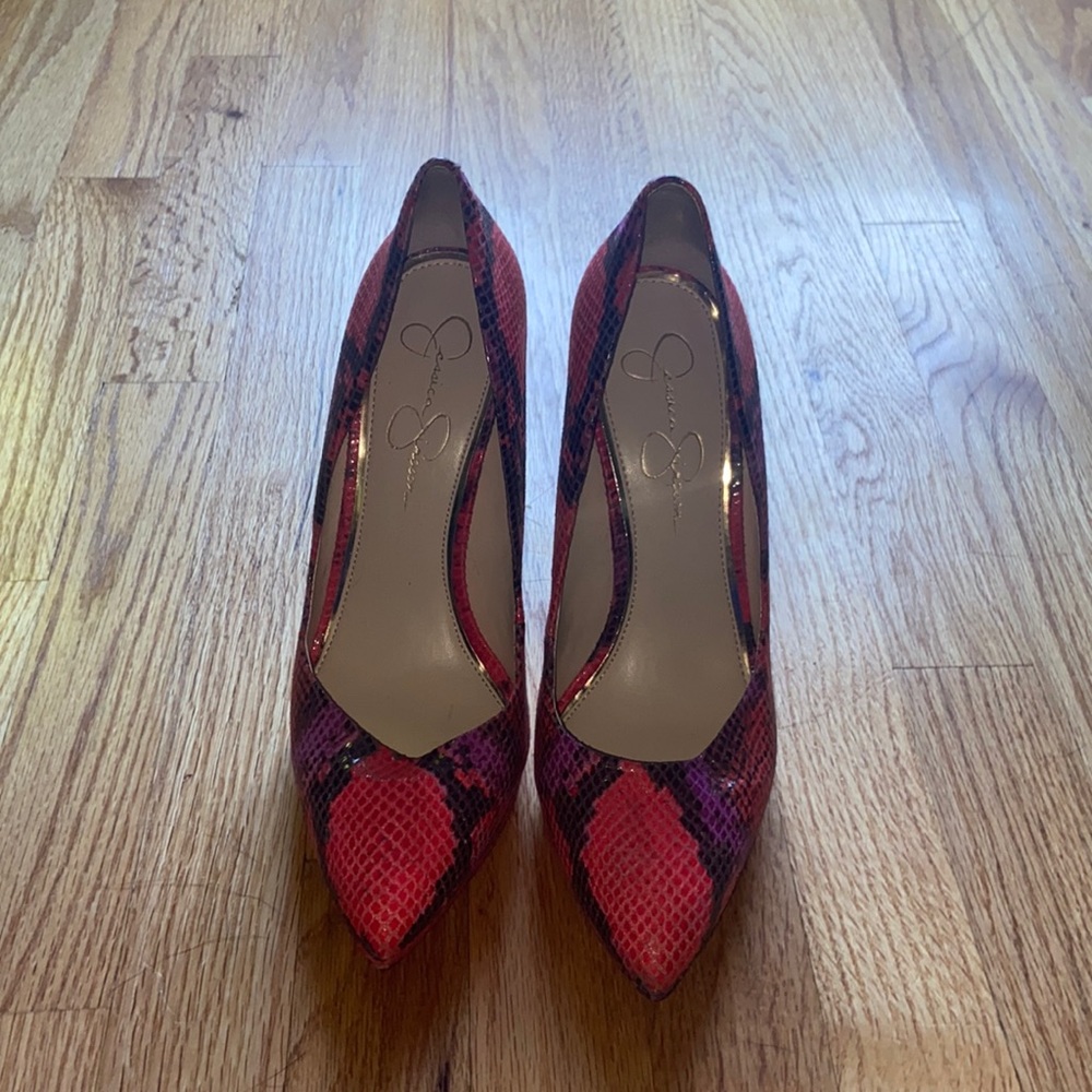 Snake embossed red, magenta, and black Jessica Simpson’s high heels.